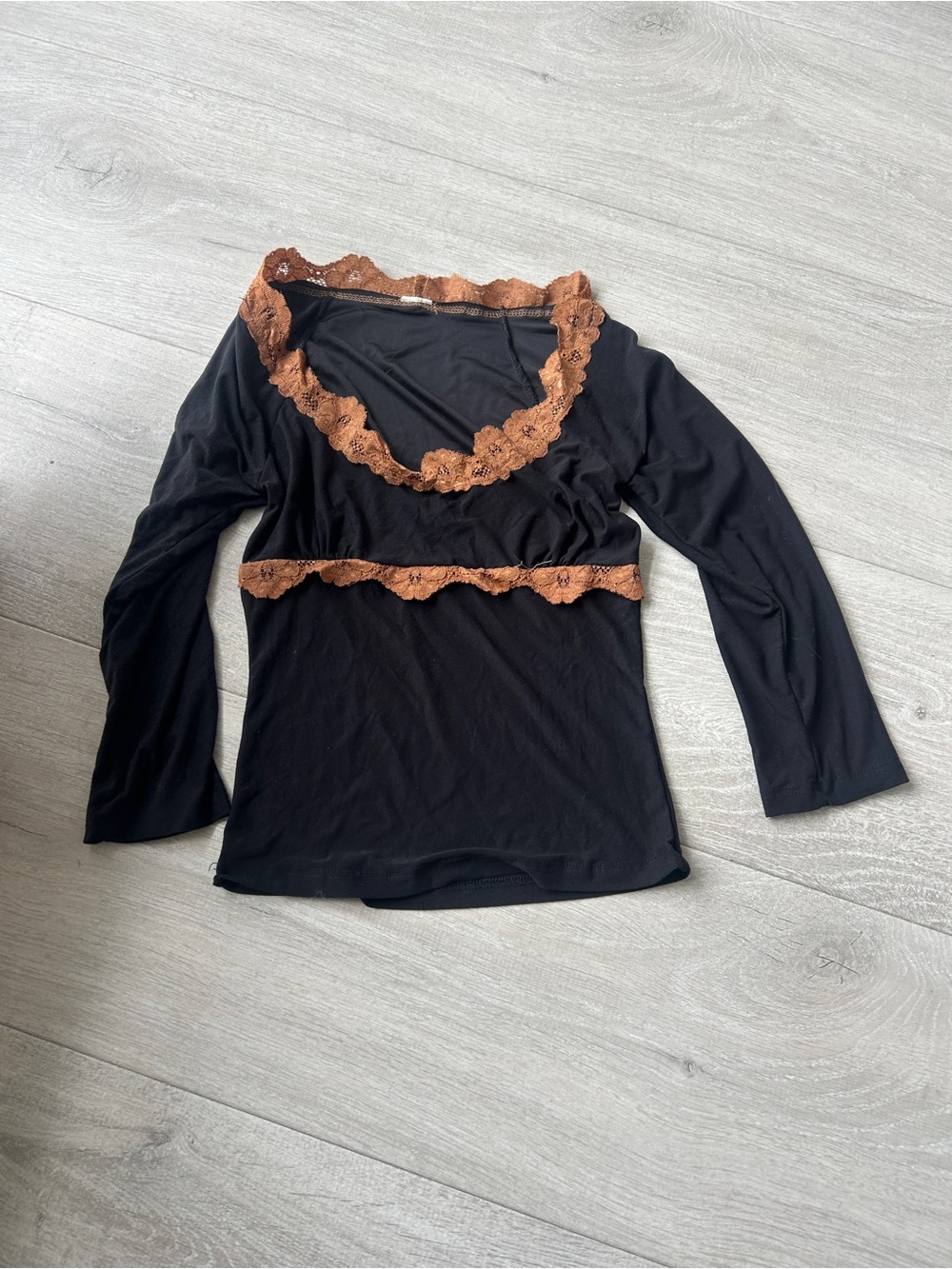 Moda international top. No tags. Black long sleeve with brown lace trim. Grunge